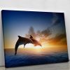 Couple jumping dolphins Canvas Print or Poster