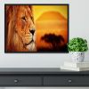 Lion portrait on savanna landscape Framed Print